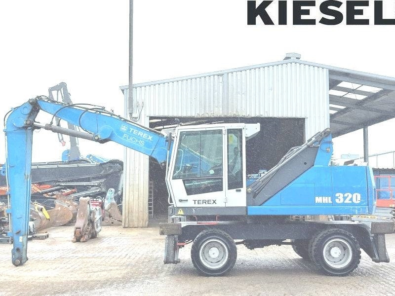 Fuchs MHL 320 D - Bager za prekladanje primarnih/ Sekundarnih surovin: slika 1 Fuchs MHL 320 D - Bager za prekladanje primarnih/ Sekundarnih surovin: slika 1