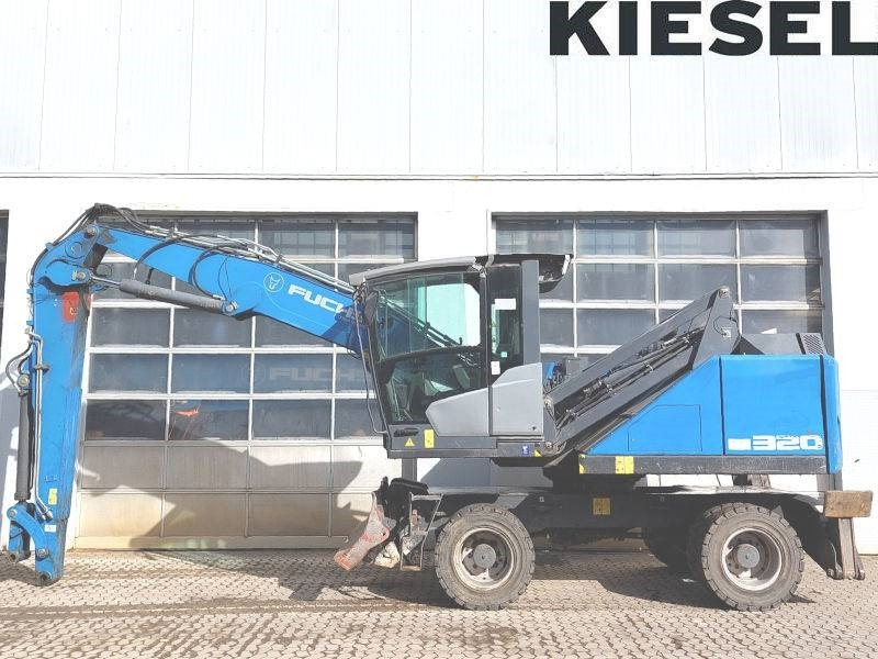 Bager za prekladanje primarnih/ Sekundarnih surovin Fuchs MHL 320 F: slika 1
