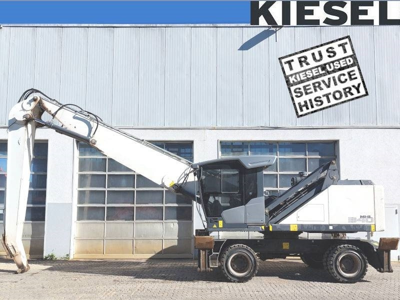 Fuchs MHL 340 F - Bager za prekladanje primarnih/ Sekundarnih surovin: slika 1 Fuchs MHL 340 F - Bager za prekladanje primarnih/ Sekundarnih surovin: slika 1