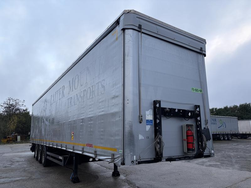 Kögel - Polprikolica s ponjavo: slika 1 Kögel - Polprikolica s ponjavo: slika 1