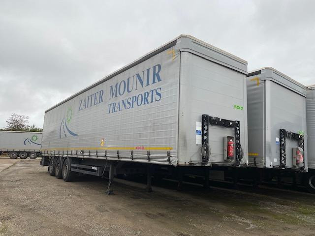 Kögel - Polprikolica s ponjavo: slika 1 Kögel - Polprikolica s ponjavo: slika 1