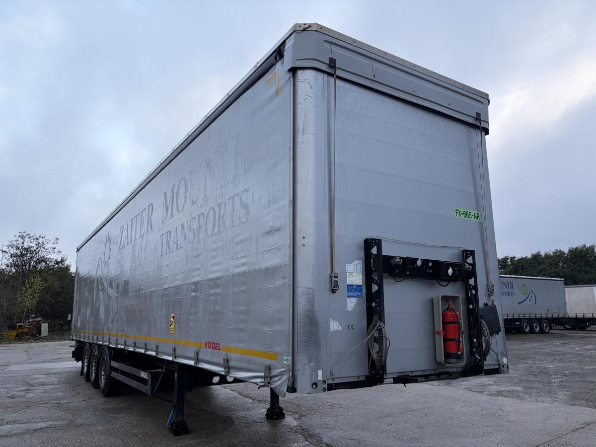 Kögel - Polprikolica s ponjavo: slika 1 Kögel - Polprikolica s ponjavo: slika 1