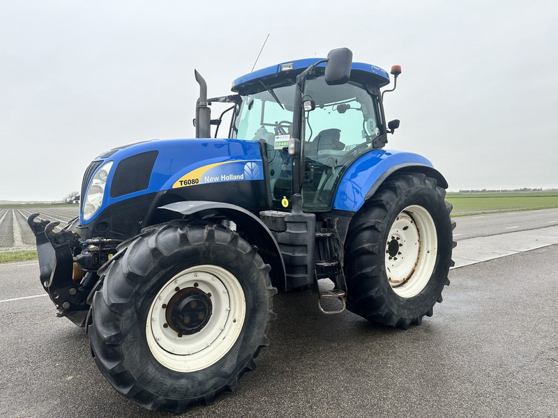 New Holland T6080 - Traktor: slika 1 New Holland T6080 - Traktor: slika 1