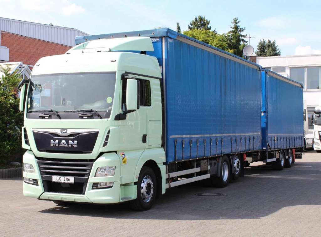 MAN TGX 26.460 Retarder Jumbo-Zug 120M3 Durchlade - Tovornjak s ponjavo: slika 1 MAN TGX 26.460 Retarder Jumbo-Zug 120M3 Durchlade - Tovornjak s ponjavo: slika 1