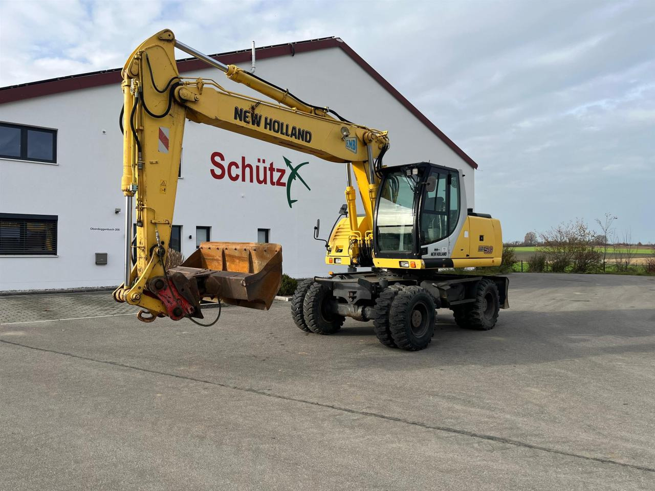 New Holland MH 5.6 inkl. Grabenlöffel, Tieflöffel - Bager na kolesih: slika 1 New Holland MH 5.6 inkl. Grabenlöffel, Tieflöffel - Bager na kolesih: slika 1