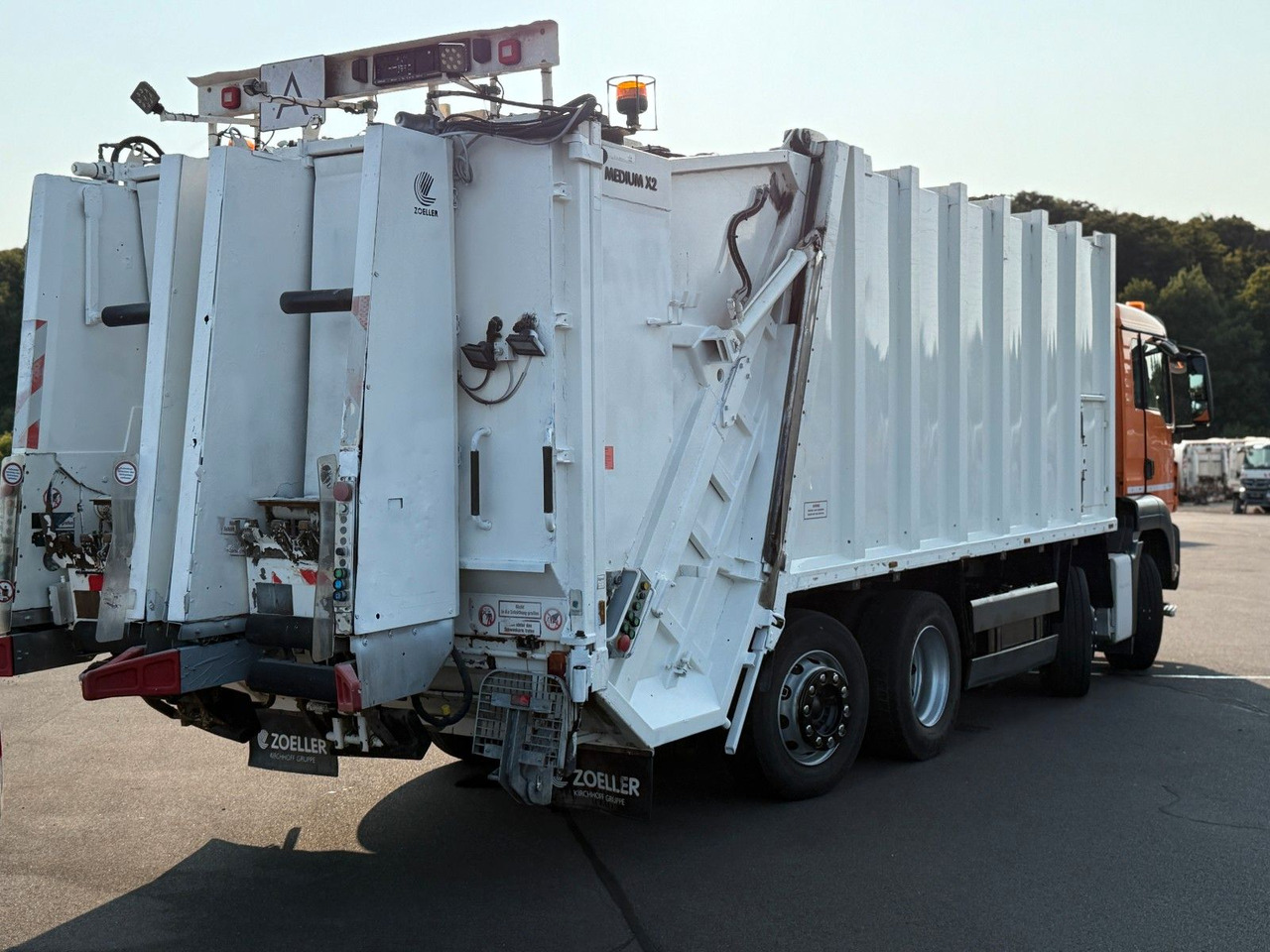 MAN TGS 32.360 8x2 Zoeller Mekam, duo Schütte - Smetarski tovornjak: slika 4 MAN TGS 32.360 8x2 Zoeller Mekam, duo Schütte - Smetarski tovornjak: slika 4