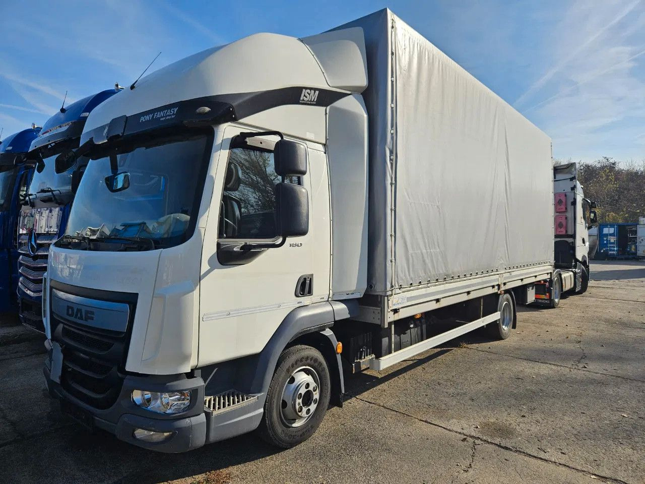 DAF LF 180 7.5 t - Tovornjak s ponjavo: slika 1 DAF LF 180 7.5 t - Tovornjak s ponjavo: slika 1