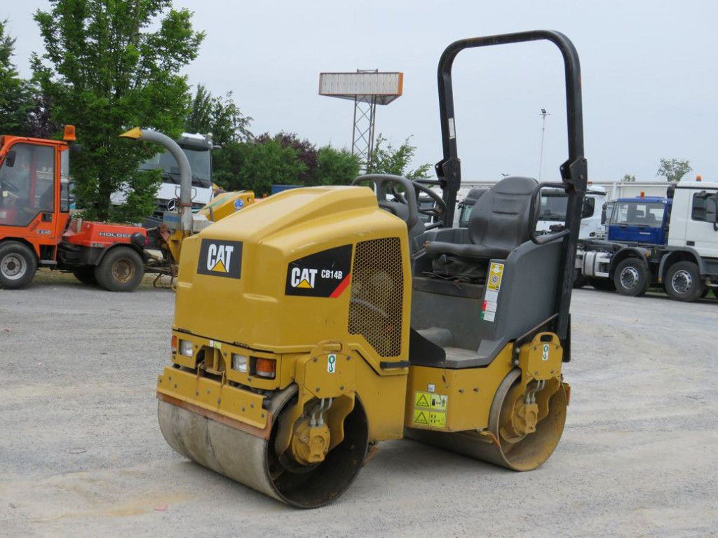 CAT Tandem-Vibrationswalze CB14 B Baumaschine - Valjar: slika 1 CAT Tandem-Vibrationswalze CB14 B Baumaschine - Valjar: slika 1