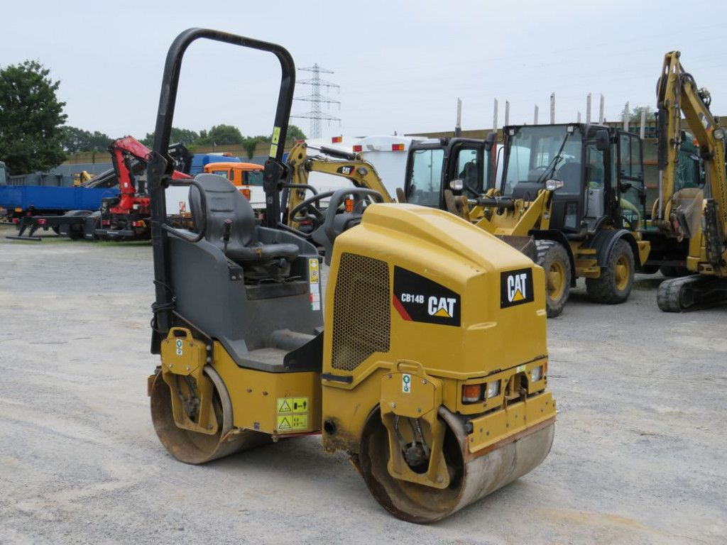 CAT Tandem-Vibrationswalze CB14 B Baumaschine - Valjar: slika 2 CAT Tandem-Vibrationswalze CB14 B Baumaschine - Valjar: slika 2