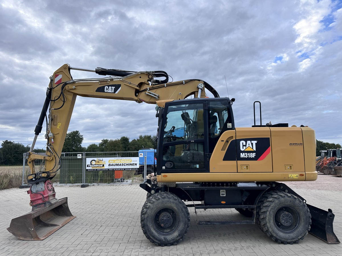 CATERPILLAR M 318 F Offset boom Deutsche Maschine Top ! - Bager na kolesih: slika 1 CATERPILLAR M 318 F Offset boom Deutsche Maschine Top ! - Bager na kolesih: slika 1
