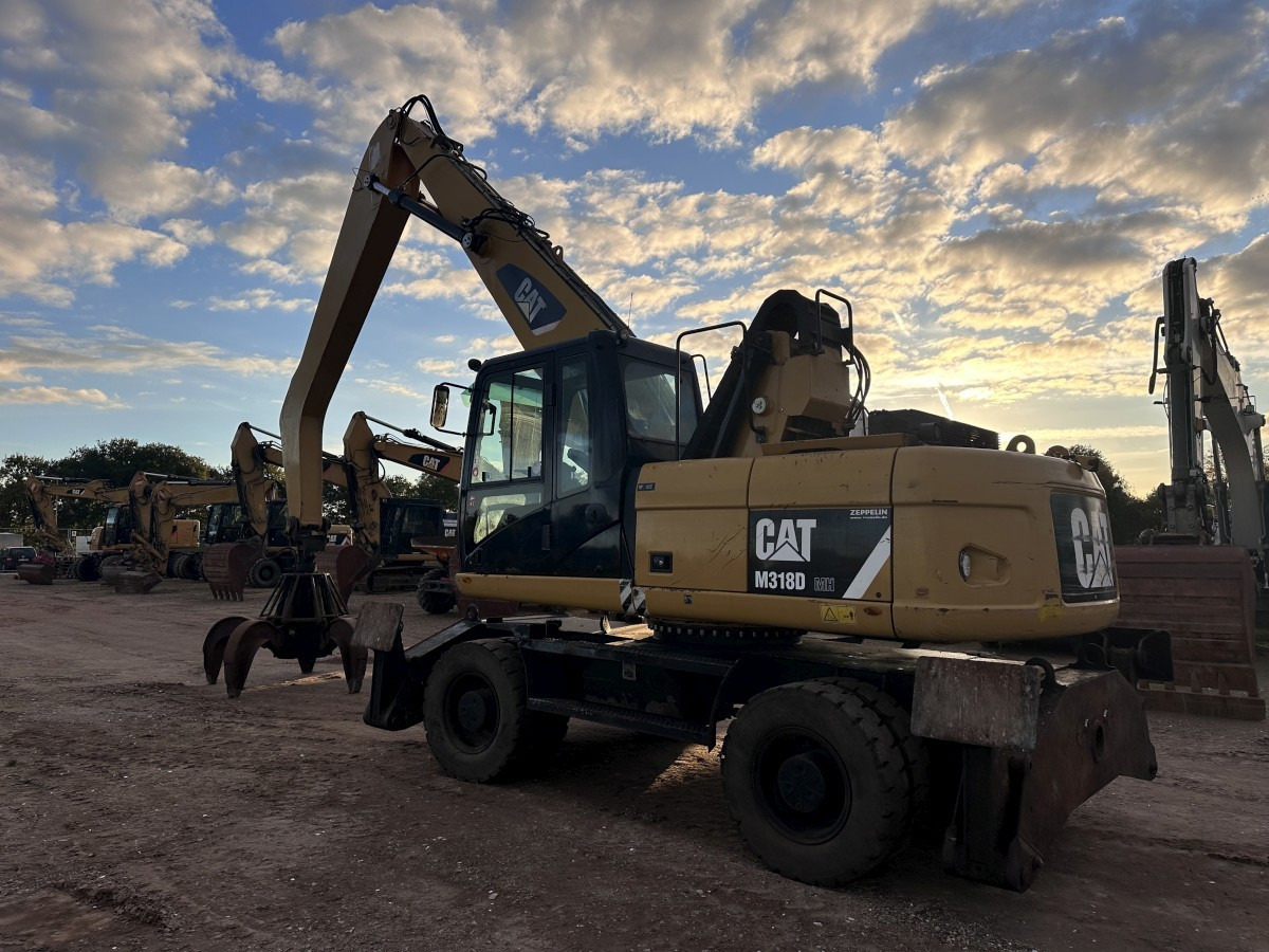 CATERPILLAR M 318 MH mit Greifer Kein 3022 3026 320 322 - Bager za prekladanje primarnih/ Sekundarnih surovin: slika 4 CATERPILLAR M 318 MH mit Greifer Kein 3022 3026 320 322 - Bager za prekladanje primarnih/ Sekundarnih surovin: slika 4