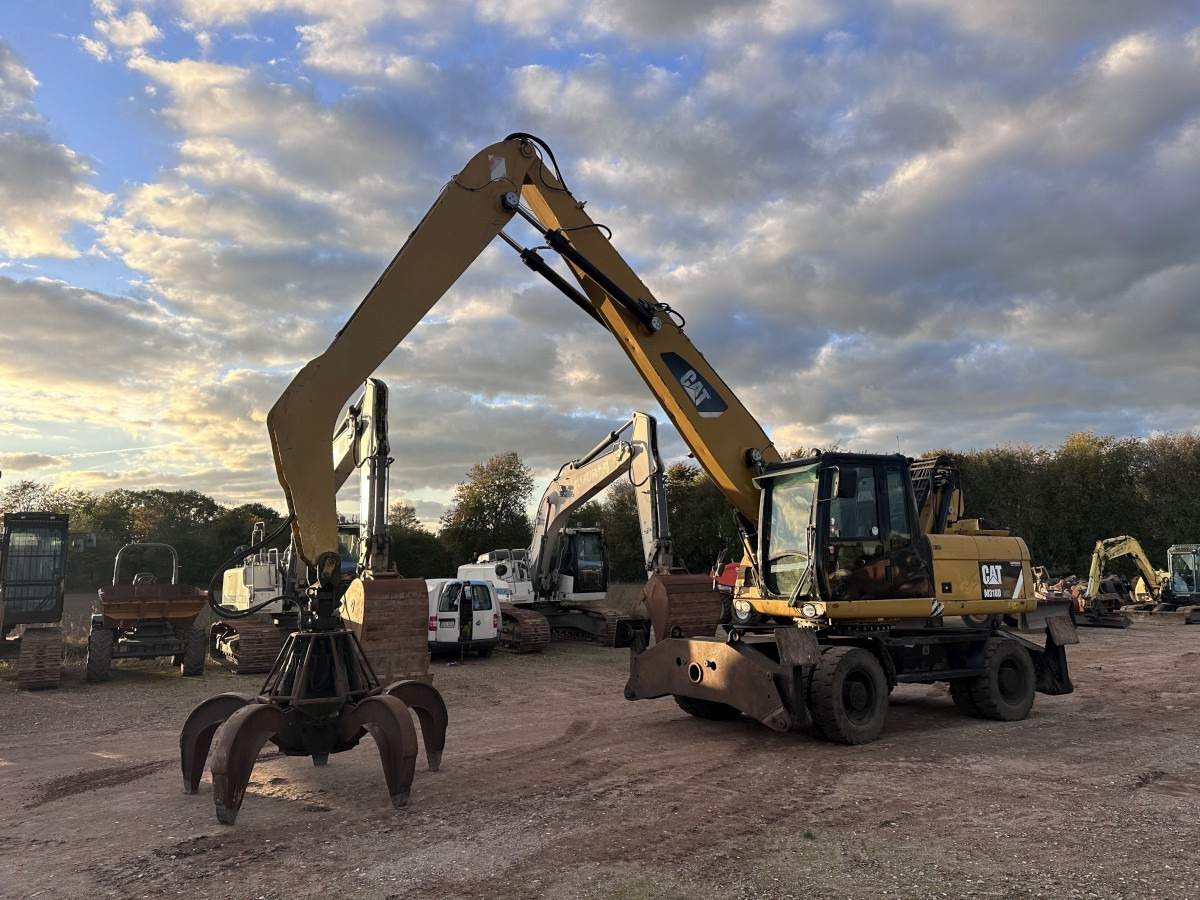 CATERPILLAR M 318 MH mit Greifer Kein 3022 3026 320 322 - Bager na kolesih: slika 1 CATERPILLAR M 318 MH mit Greifer Kein 3022 3026 320 322 - Bager na kolesih: slika 1