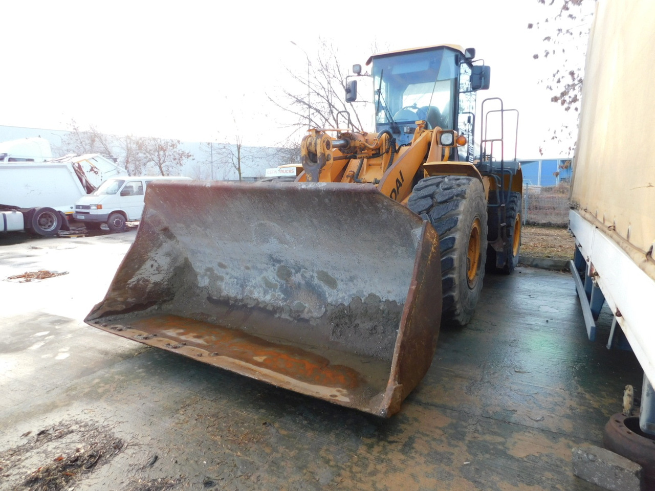 Hyundai Echipament incarcator frontal hl 760 7a - Kolesni nakladalec: slika 1 Hyundai Echipament incarcator frontal hl 760 7a - Kolesni nakladalec: slika 1