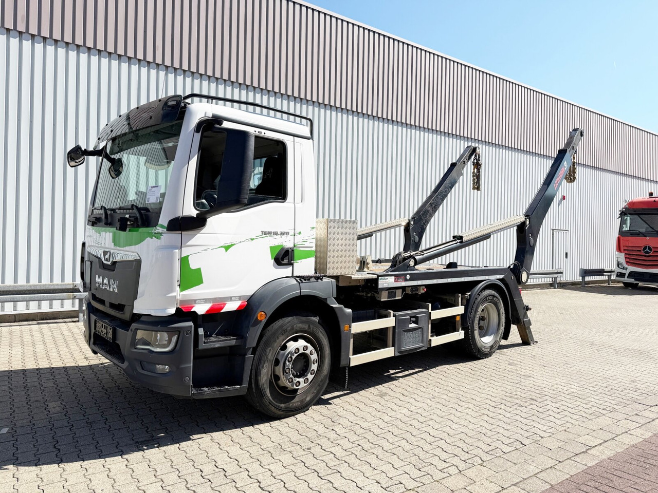 MAN TGM 18.320 4x2 BL TGM 18.320 4x2 BL, Hiab Tele-Absetzanlage, Funk - Komunalni tovornjak: slika 1 MAN TGM 18.320 4x2 BL TGM 18.320 4x2 BL, Hiab Tele-Absetzanlage, Funk - Komunalni tovornjak: slika 1