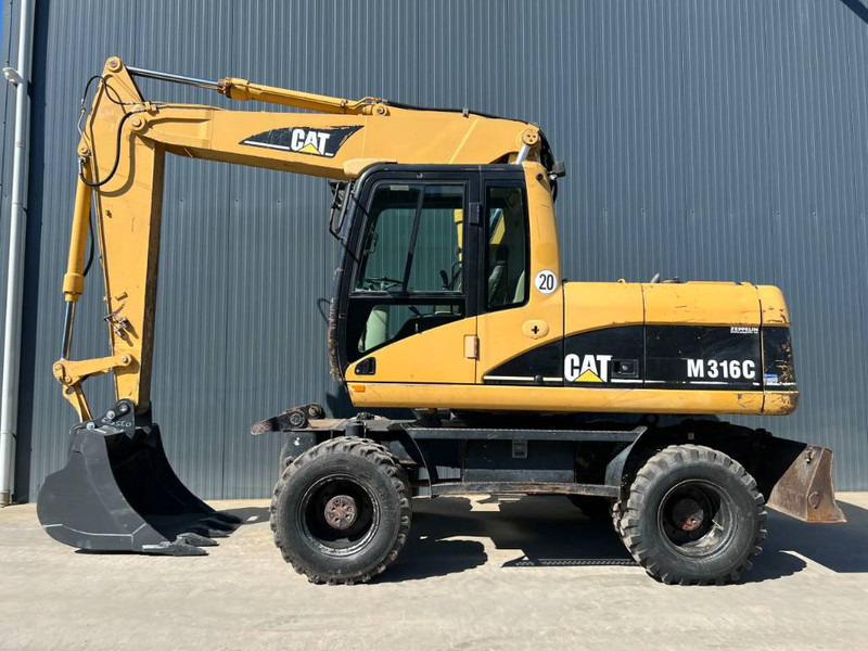 Cat M316C - Bager na kolesih: slika 5 Cat M316C - Bager na kolesih: slika 5