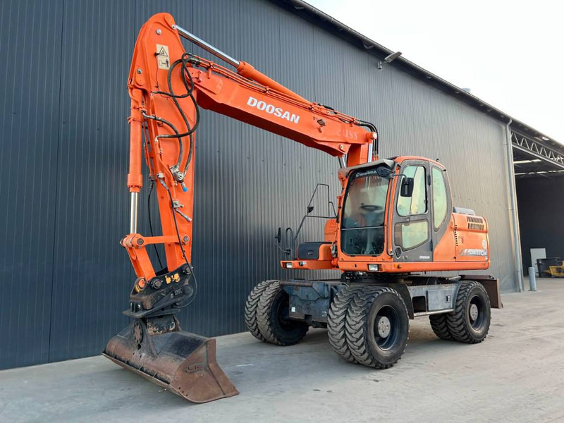 Doosan DX170W - Bager na kolesih: slika 1 Doosan DX170W - Bager na kolesih: slika 1