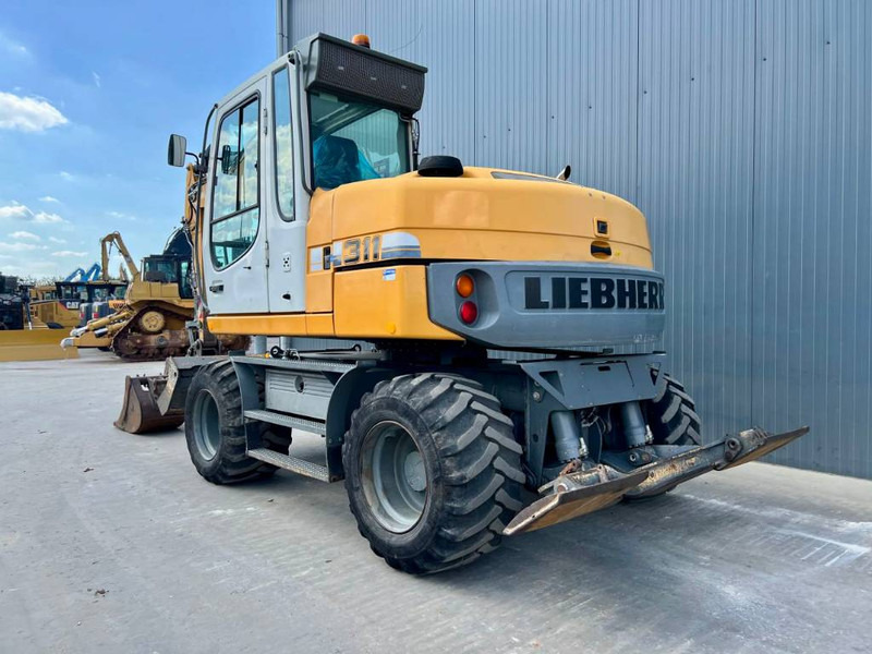 Liebherr A311 Litronic - Bager na kolesih: slika 2 Liebherr A311 Litronic - Bager na kolesih: slika 2