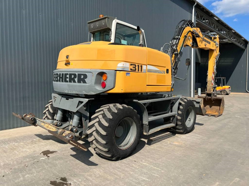 Liebherr A311 Litronic - Bager na kolesih: slika 4 Liebherr A311 Litronic - Bager na kolesih: slika 4