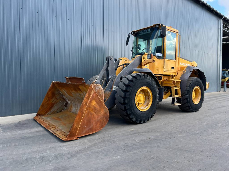 Volvo L60E - Kolesni nakladalec: slika 1 Volvo L60E - Kolesni nakladalec: slika 1