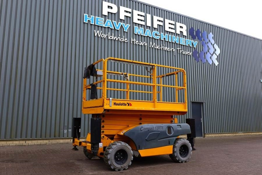 Haulotte Compact 12RTE Electric, 12m Working Height, 450kg - Škarjasta dvižna ploščad: slika 1 Haulotte Compact 12RTE Electric, 12m Working Height, 450kg - Škarjasta dvižna ploščad: slika 1