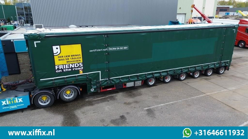 Meusburger 6-ass. Semi dieplader met elektische huifopbouw / 3x naloop gestuurd - Nizko noseča polprikolica: slika 1 Meusburger 6-ass. Semi dieplader met elektische huifopbouw / 3x naloop gestuurd - Nizko noseča polprikolica: slika 1