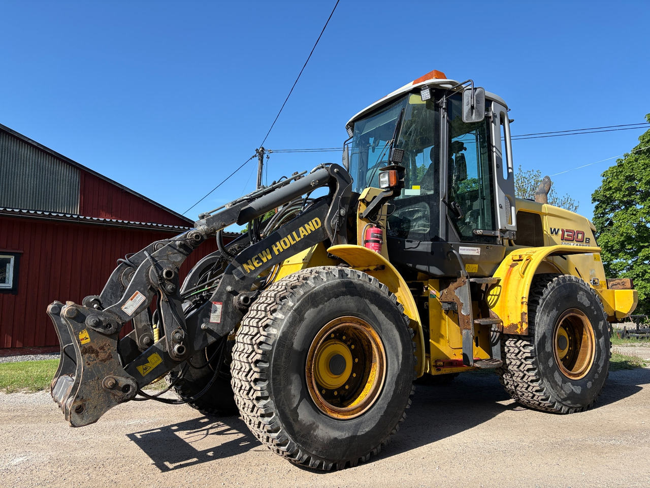 New Holland W130B - Kolesni nakladalec: slika 1 New Holland W130B - Kolesni nakladalec: slika 1
