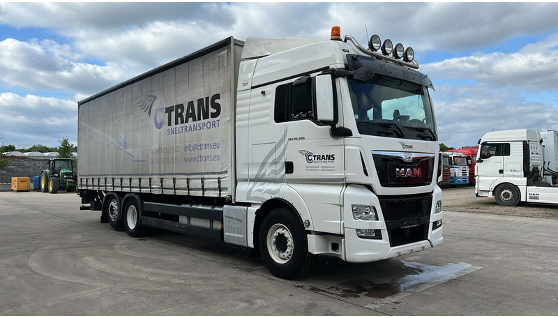 MAN TGX 26.400 (EURO 6 / 6X2 / LIFT / HAYON / BELGIAN TRUCK / GUTE ZUSTAND !! / 8.40 BOX LENGTH) - Tovornjak s ponjavo: slika 2 MAN TGX 26.400 (EURO 6 / 6X2 / LIFT / HAYON / BELGIAN TRUCK / GUTE ZUSTAND !! / 8.40 BOX LENGTH) - Tovornjak s ponjavo: slika 2