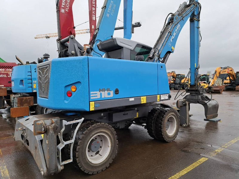 Fuchs MHL 310 - Bager za prekladanje primarnih/ Sekundarnih surovin: slika 1 Fuchs MHL 310 - Bager za prekladanje primarnih/ Sekundarnih surovin: slika 1