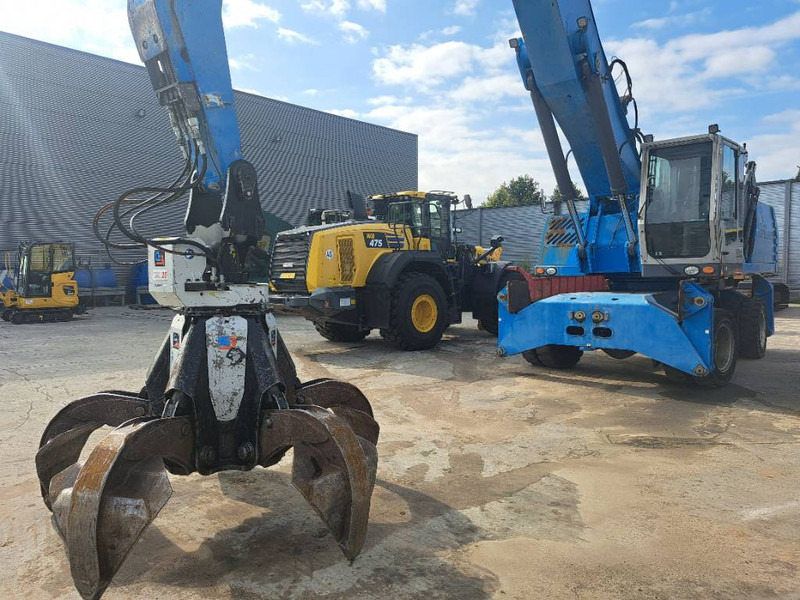 Fuchs MHL 360 D - Bager za prekladanje primarnih/ Sekundarnih surovin: slika 1 Fuchs MHL 360 D - Bager za prekladanje primarnih/ Sekundarnih surovin: slika 1