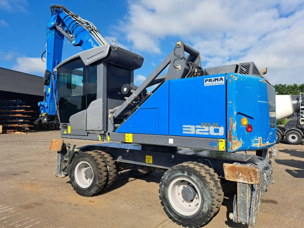 Fuchs MHL320F - Bager za prekladanje primarnih/ Sekundarnih surovin: slika 1 Fuchs MHL320F - Bager za prekladanje primarnih/ Sekundarnih surovin: slika 1