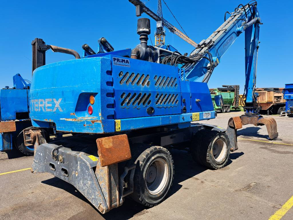Fuchs MHL331E + Grapple - Bager za prekladanje primarnih/ Sekundarnih surovin: slika 1 Fuchs MHL331E + Grapple - Bager za prekladanje primarnih/ Sekundarnih surovin: slika 1