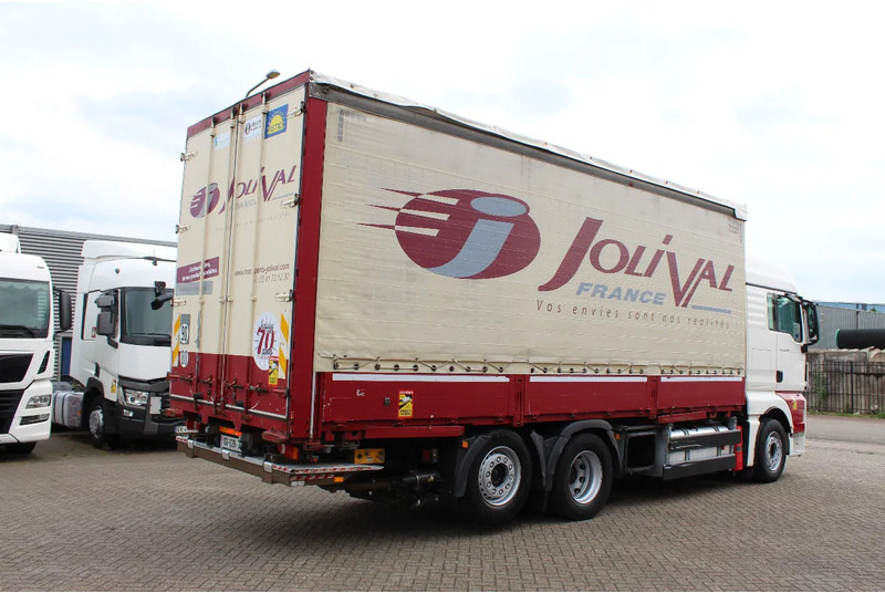 MAN TGX 26.440 * EURO5 * 6X2 * LIFT AXLE * - Tovornjak s ponjavo: slika 4 MAN TGX 26.440 * EURO5 * 6X2 * LIFT AXLE * - Tovornjak s ponjavo: slika 4