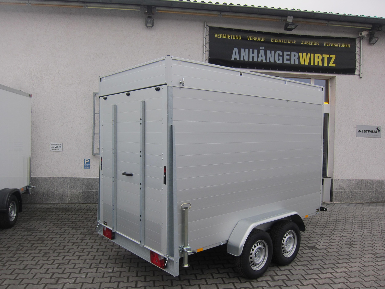 ALUBOXX Deckelanhänger GTT 2500 VT4 301x151x188cm Heckrampe (M) 2500kg order online Aktion - Prikolica zabojnik: slika 4 ALUBOXX Deckelanhänger GTT 2500 VT4 301x151x188cm Heckrampe (M) 2500kg order online Aktion - Prikolica zabojnik: slika 4