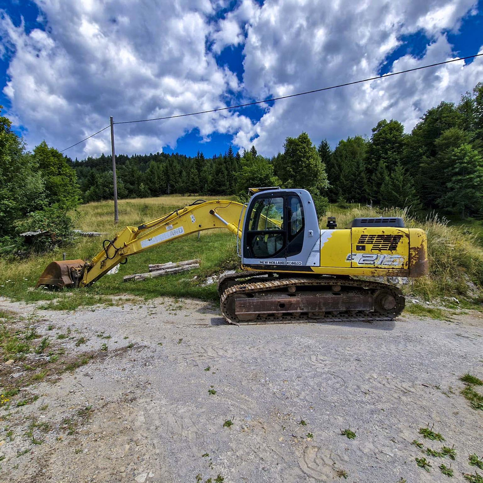 New Holland Kobelco E215 - Bager goseničar: slika 1 New Holland Kobelco E215 - Bager goseničar: slika 1
