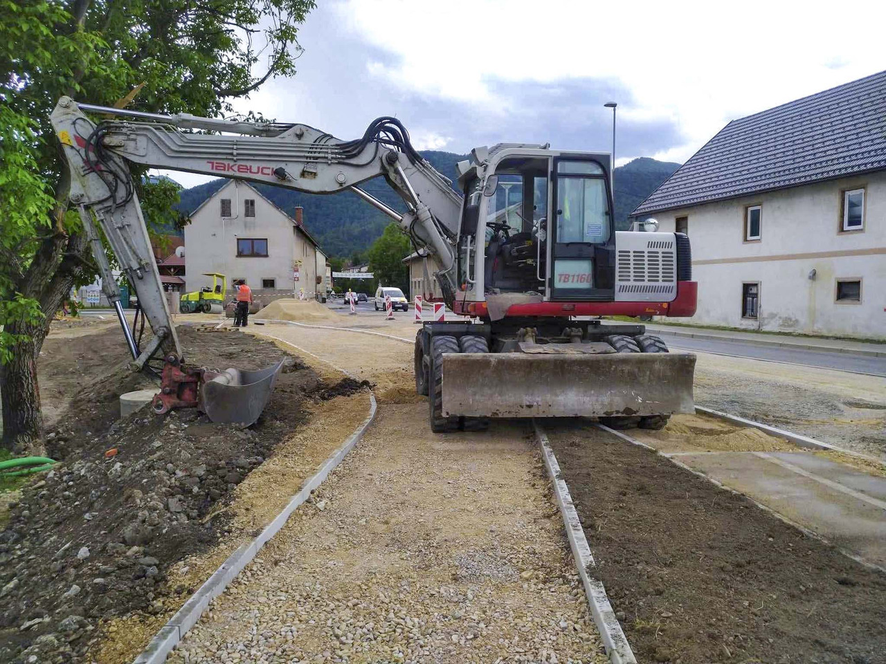 TAKEUCHI TB1160W - Bager na kolesih: slika 1 TAKEUCHI TB1160W - Bager na kolesih: slika 1