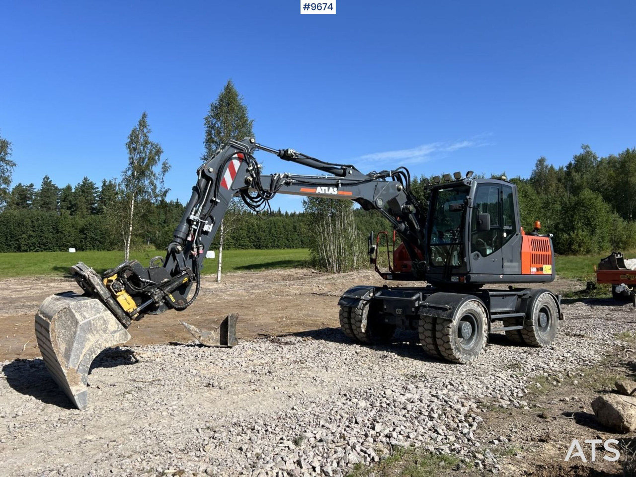 Bager na kolesih Atlas 140 W Wheel excavator with wagon and attachments: slika 1