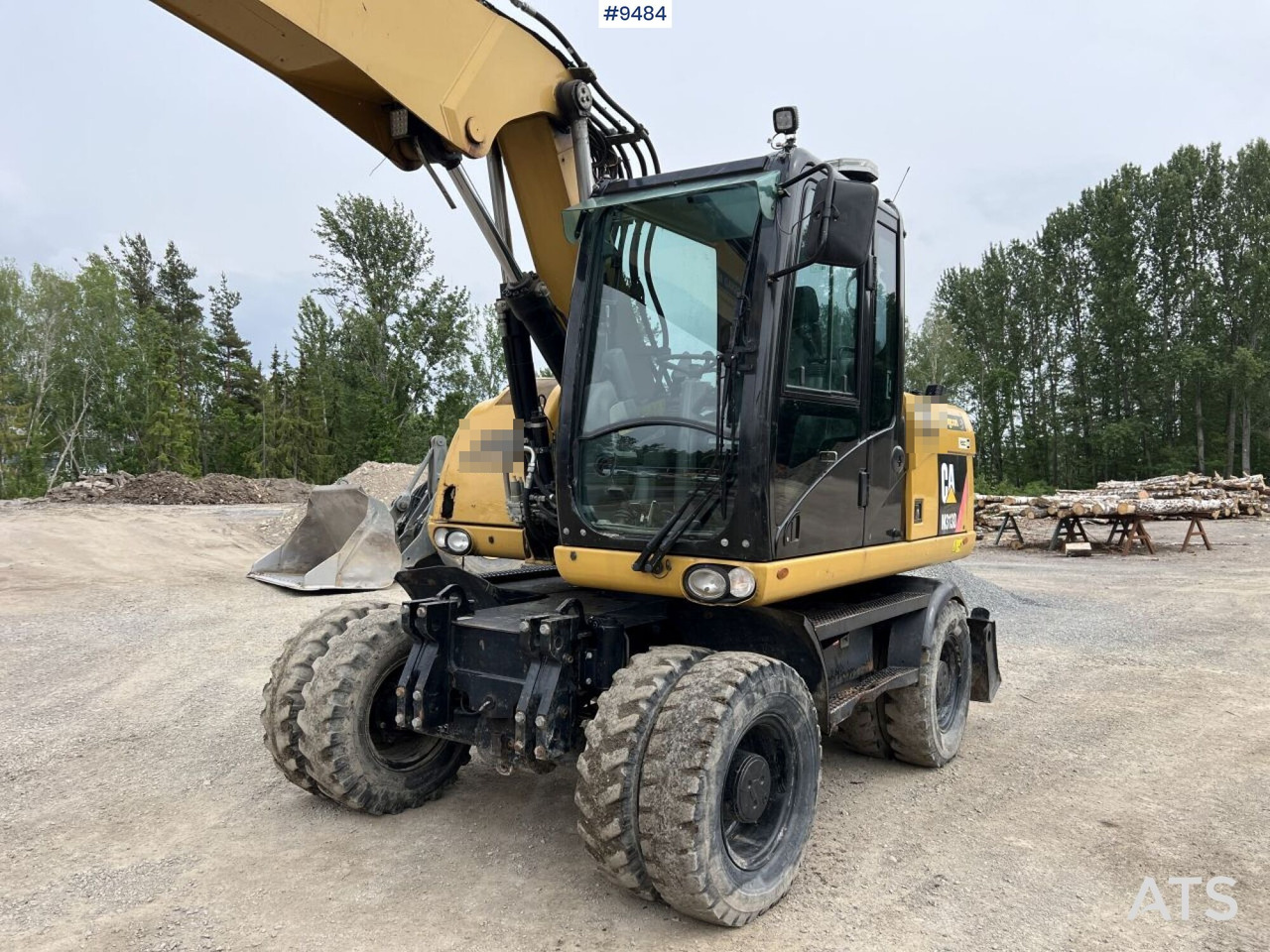 CAT M313D with tipping wagon and attachments (VIDEO) - Bager na kolesih: slika 4 CAT M313D with tipping wagon and attachments (VIDEO) - Bager na kolesih: slika 4