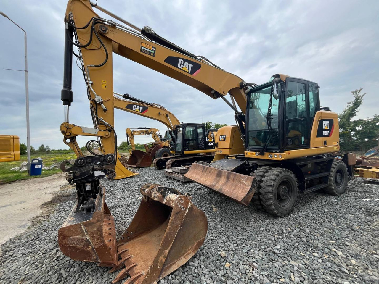 CAT M315F - Bager na kolesih: slika 1 CAT M315F - Bager na kolesih: slika 1