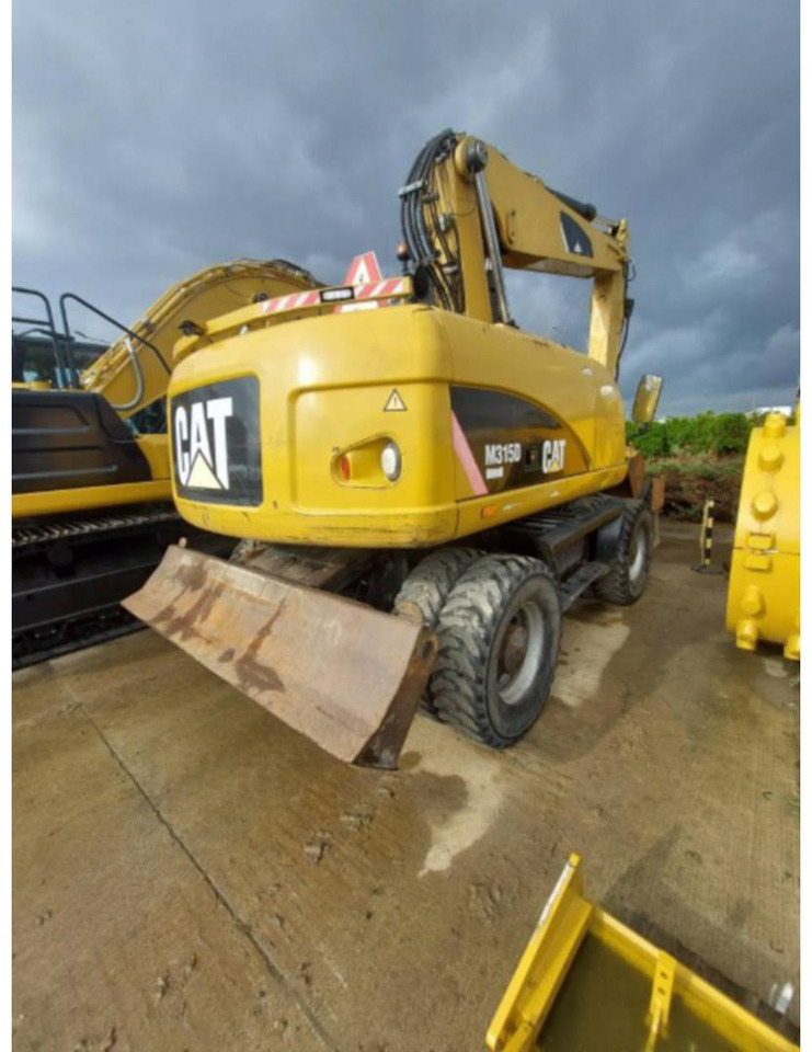 CAT M315D - Bager na kolesih: slika 3 CAT M315D - Bager na kolesih: slika 3