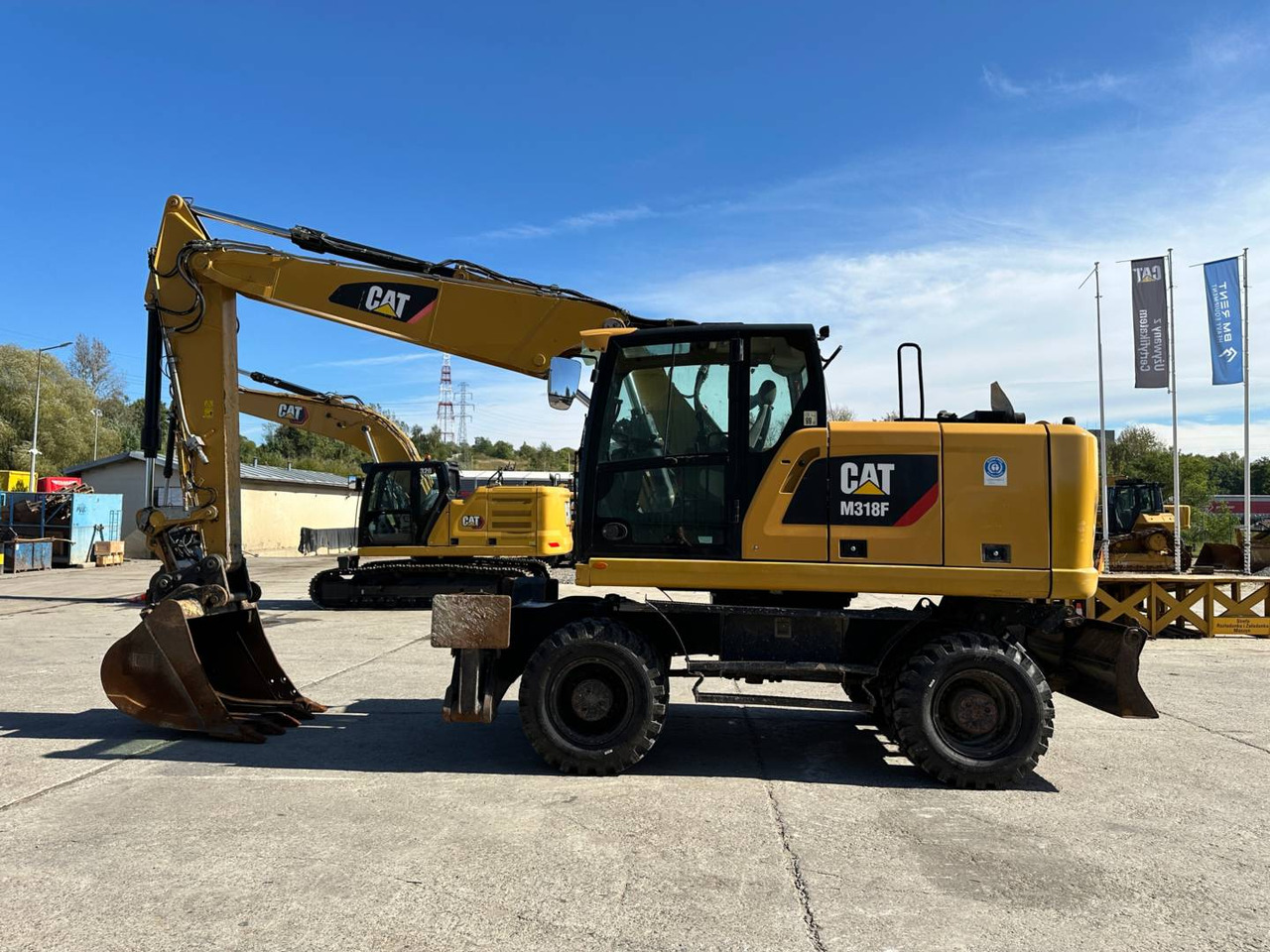Kolesni nakladalec CAT M318F: slika 13