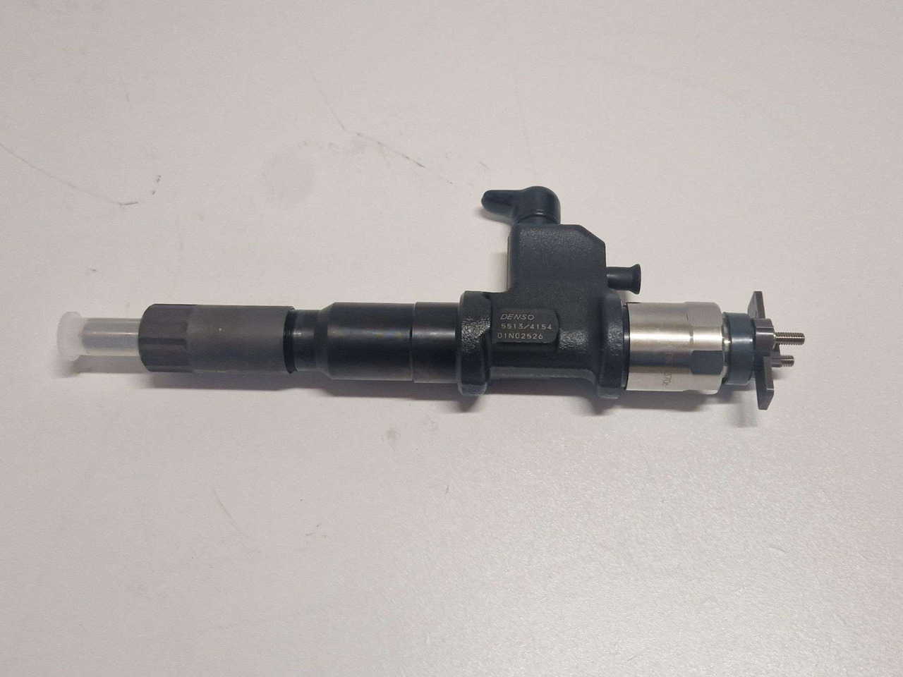 Isuzu 8976034154 Fuel Injector Denso 5513/4154 - Motor in deli za Gradbeni stroj: slika 1 Isuzu 8976034154 Fuel Injector Denso 5513/4154 - Motor in deli za Gradbeni stroj: slika 1