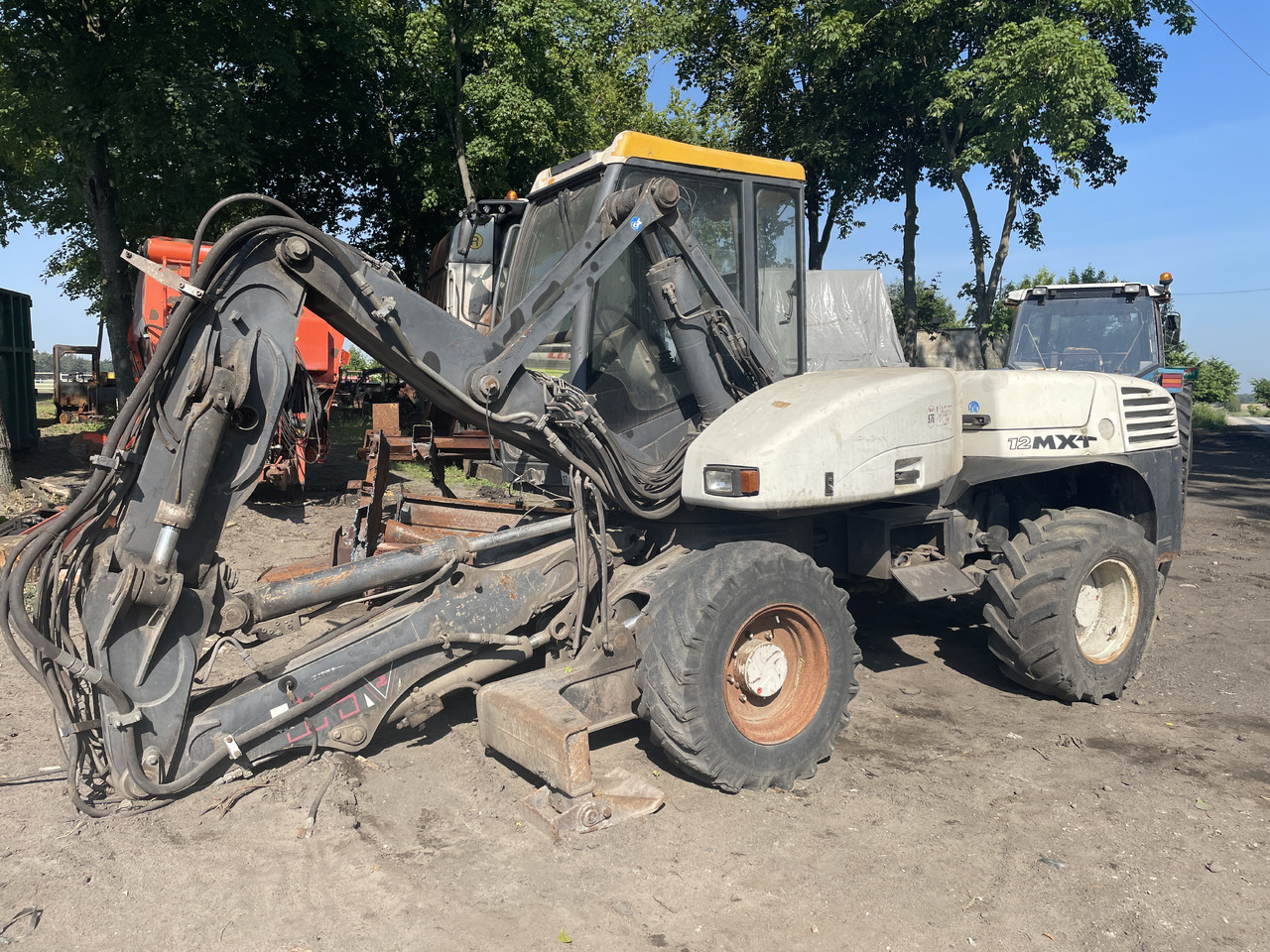 Mecalac 12MXT 12 MXT - części - kabina mosty siłowniki koła zwolnica skrzynia - Bočni reduktor za Kmetijski stroj: slika 5 Mecalac 12MXT 12 MXT - części - kabina mosty siłowniki koła zwolnica skrzynia - Bočni reduktor za Kmetijski stroj: slika 5