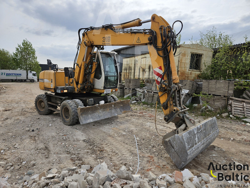 Liebherr A 316 Litronic - Bager na kolesih: slika 2 Liebherr A 316 Litronic - Bager na kolesih: slika 2