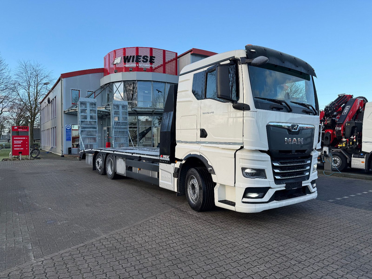 MAN Baumaschinen- Arbeitsbühnentransporter Rampen - Vlečno vozilo: slika 1 MAN Baumaschinen- Arbeitsbühnentransporter Rampen - Vlečno vozilo: slika 1
