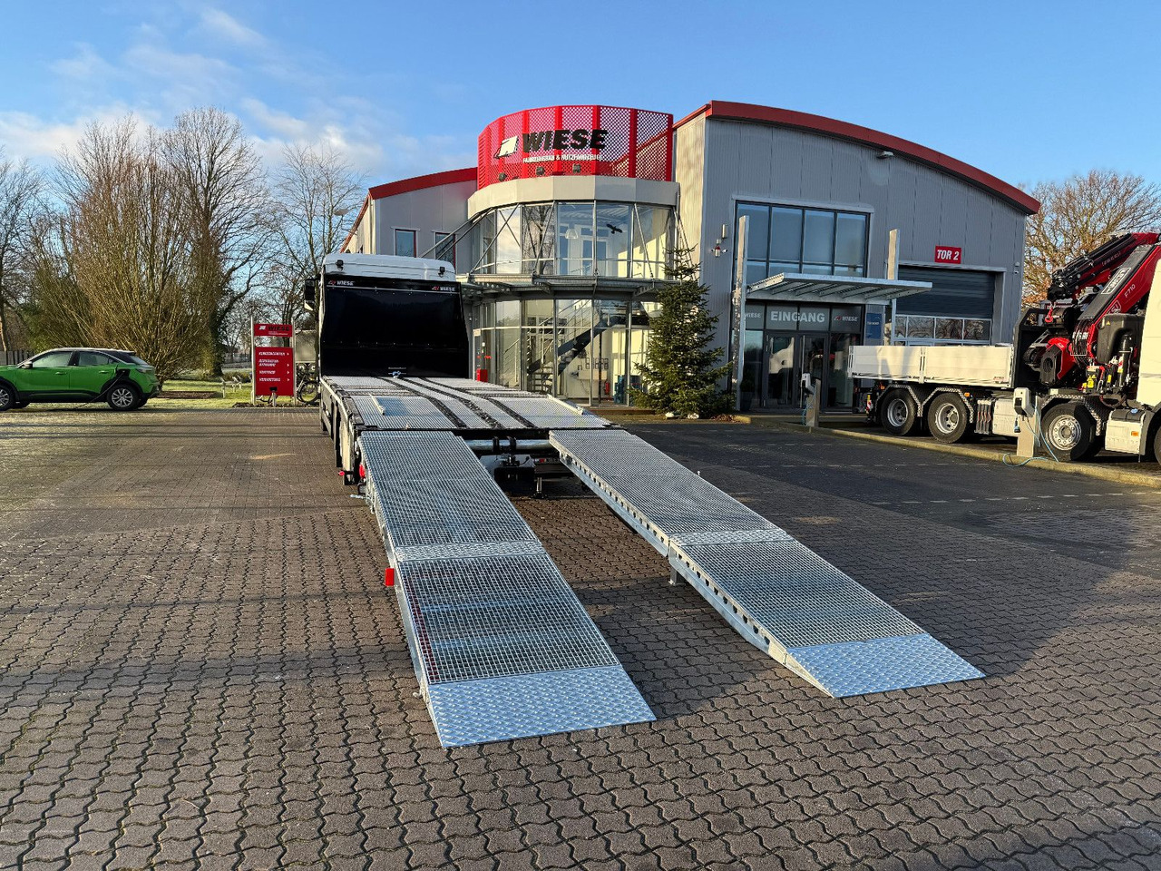 MAN Baumaschinen- Arbeitsbühnentransporter Rampen - Tovornjak avtotransporter: slika 4 MAN Baumaschinen- Arbeitsbühnentransporter Rampen - Tovornjak avtotransporter: slika 4