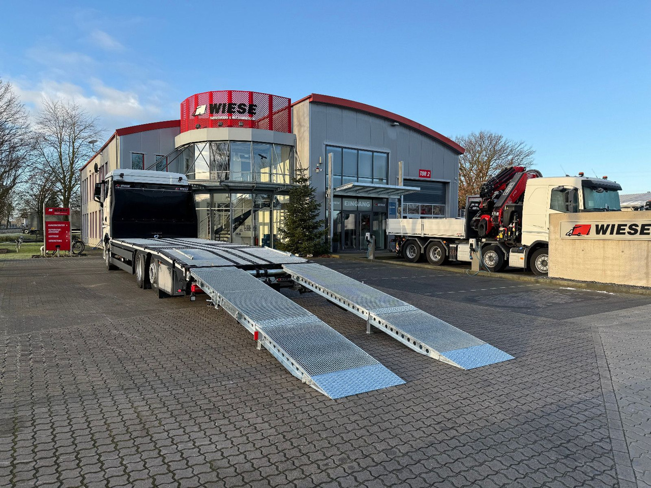 MAN Baumaschinen- Arbeitsbühnentransporter Rampen - Tovornjak avtotransporter: slika 1 MAN Baumaschinen- Arbeitsbühnentransporter Rampen - Tovornjak avtotransporter: slika 1
