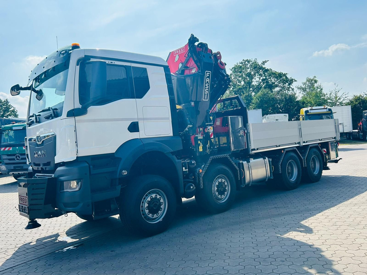 MAN TGS 41.520 8x8 mit Fassi Ladekran F710RA.2.26 - Tovornjak s kesonom: slika 5 MAN TGS 41.520 8x8 mit Fassi Ladekran F710RA.2.26 - Tovornjak s kesonom: slika 5