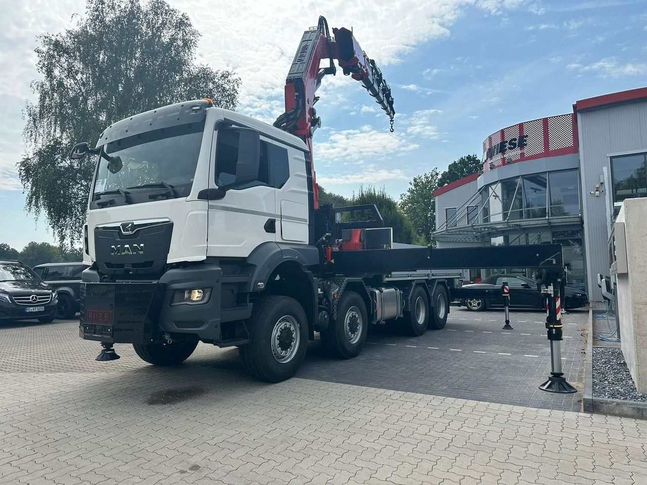 MAN TGS 41.520 8x8 mit Fassi Ladekran F710RA.2.26 - Tovornjak s kesonom: slika 2 MAN TGS 41.520 8x8 mit Fassi Ladekran F710RA.2.26 - Tovornjak s kesonom: slika 2