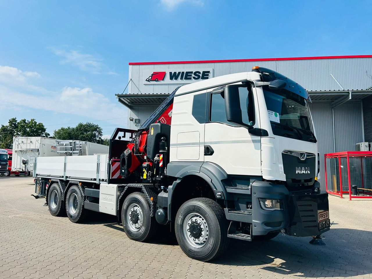 MAN TGS 41.520 8x8 mit Fassi Ladekran F710RA.2.26 - Tovornjak s kesonom: slika 4 MAN TGS 41.520 8x8 mit Fassi Ladekran F710RA.2.26 - Tovornjak s kesonom: slika 4