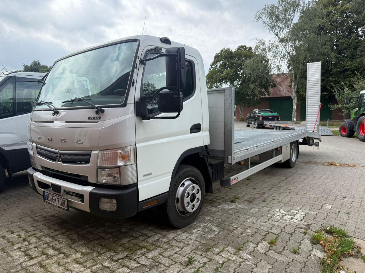 Mitsubishi Fuso Canter 7C18 Arbeitsbühnentransporter - Tovornjak avtotransporter: slika 1 Mitsubishi Fuso Canter 7C18 Arbeitsbühnentransporter - Tovornjak avtotransporter: slika 1